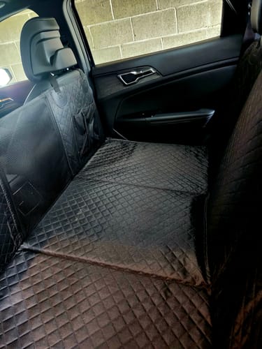 Customer photo review of NEW Waterproof Hard Bottom Car & Truck Seat Foldable Hammock Cover With Storage Pockets, Side Flaps, Headrest Straps, Seat Anchors, & Mesh Window (+FREE SAFETY BELT!)