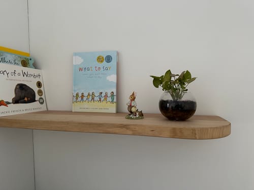 Customer photo review of Curved Floating Shelf
