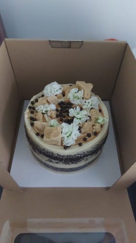 Customer photo review of chocolate caramel cake