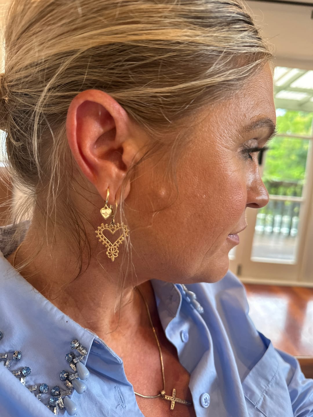 Customer photo review of North Star Heart Huggie Hoop Earrings