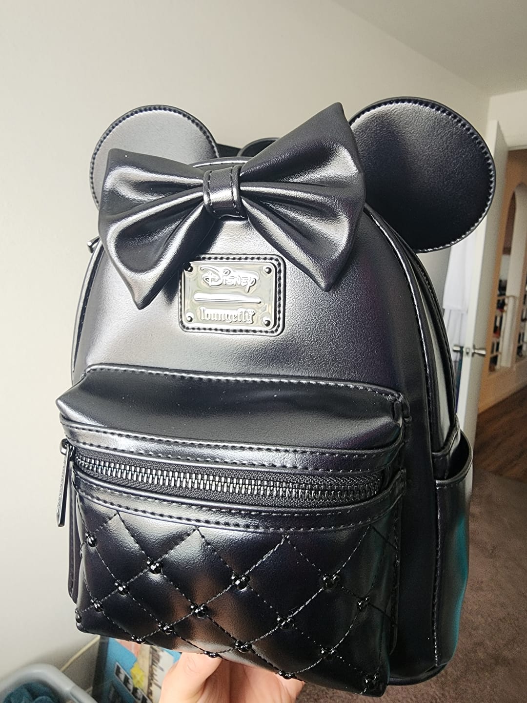 Customer photo review of Loungefly Disney The Minnie Mouse Classic Series Mini Backpack: Midnight Iridescent - 707 Street Exclusive