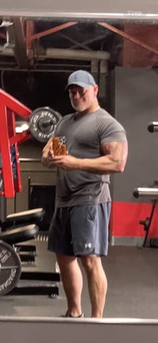 Customer photo review of Essentials Short Sleeve Athletic Fitted Tee