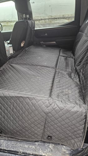 Customer photo review of NEW Waterproof Hard Bottom Car & Truck Seat Foldable Hammock Cover With Storage Pockets, Side Flaps, Headrest Straps, Seat Anchors, & Mesh Window (+FREE SAFETY BELT!)