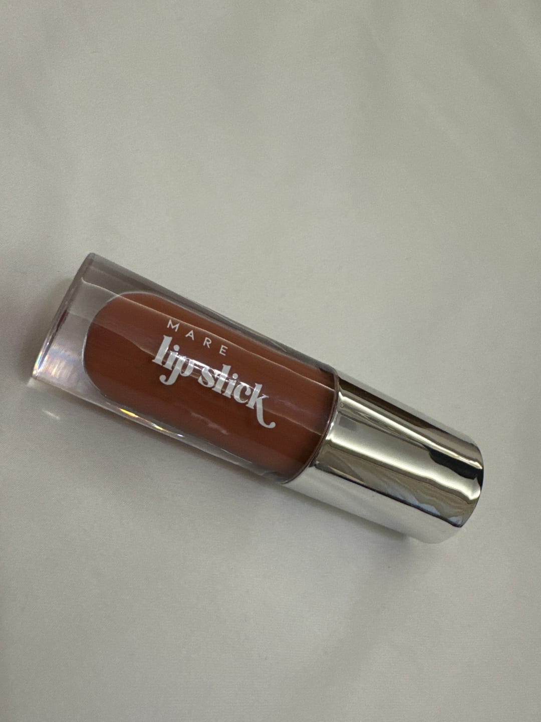 Customer photo review of Lip Slick - Hydrating Tinted Lip Oil