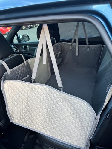 Customer photo review of NEW Waterproof Hard Bottom Car & Truck Seat Foldable Hammock Cover With Storage Pockets, Side Flaps, Headrest Straps, Seat Anchors, & Mesh Window (+FREE SAFETY BELT!)