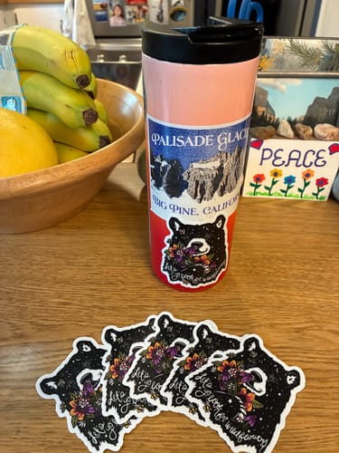 Customer photo review of "Let's go look for wildflowers" bear sticker