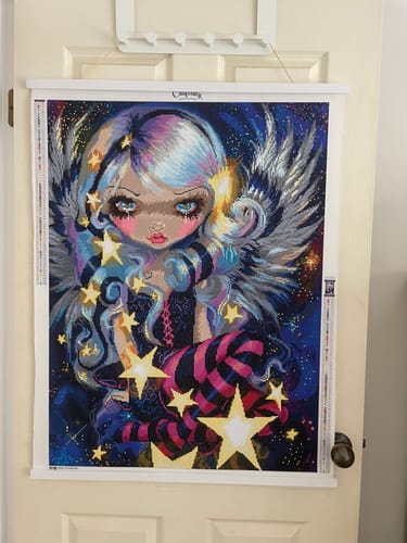 Customer photo review of Magnetic Poster Hangers - White, Black and Natural Timber