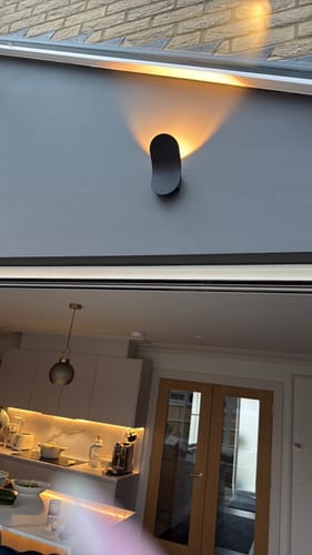 Customer photo review of Minimalist Modern Wall Sconce in Black/White Finish