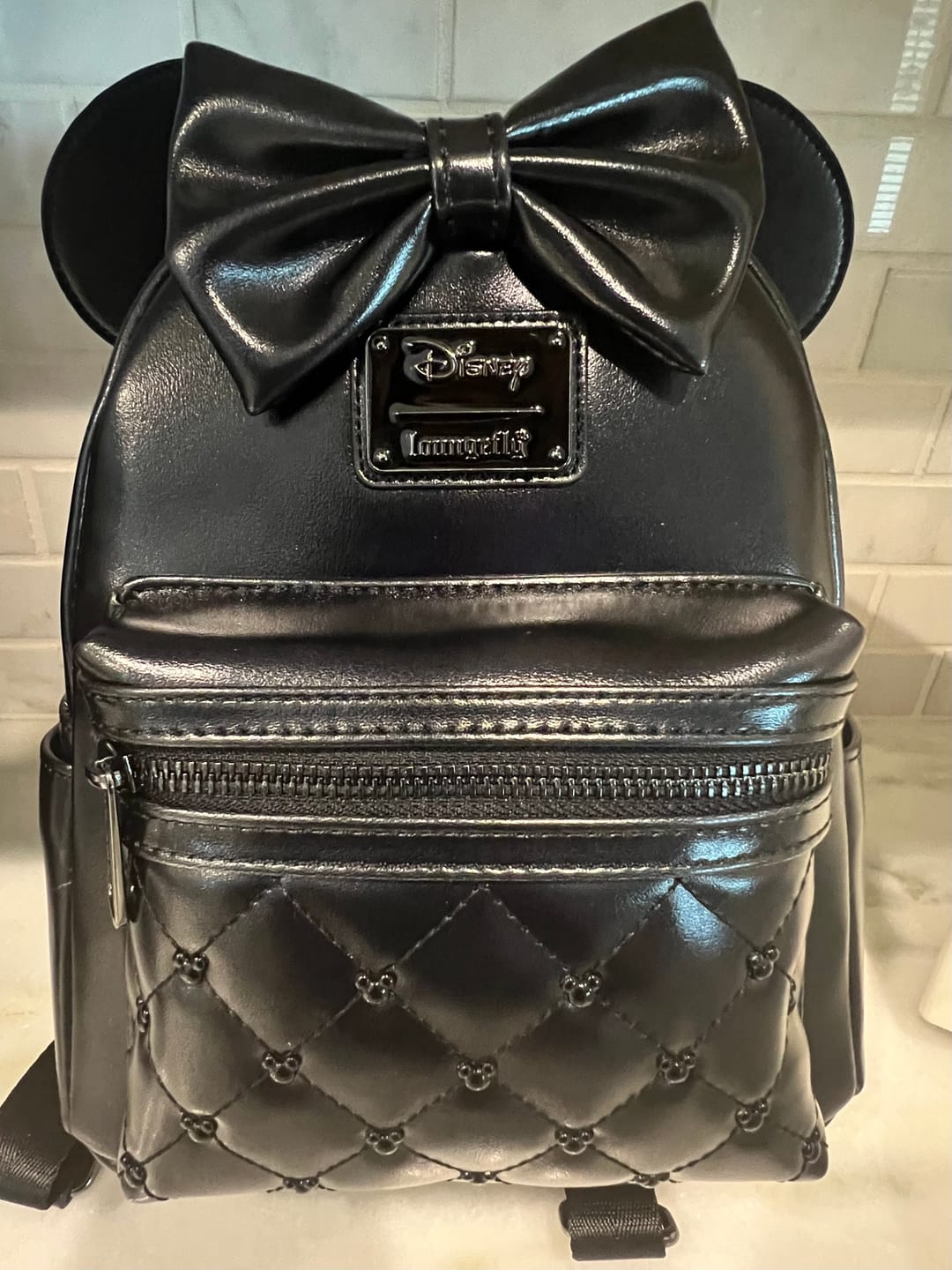 Customer photo review of Loungefly Disney The Minnie Mouse Classic Series Mini Backpack: Midnight Iridescent - 707 Street Exclusive