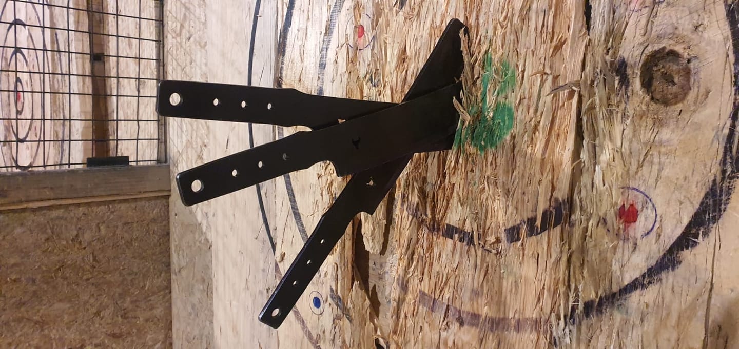 Customer photo review of Besito Slim Throwing Knives: Purple Bevel (Set of 3)