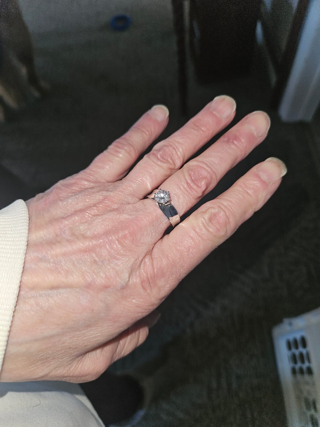 Customer photo review of Solitaire Round Moissanite Concave Wide Band Engagement Ring