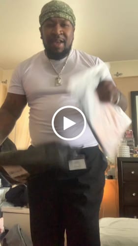 Customer video review of "Hussle & Motivate" T-Shirt