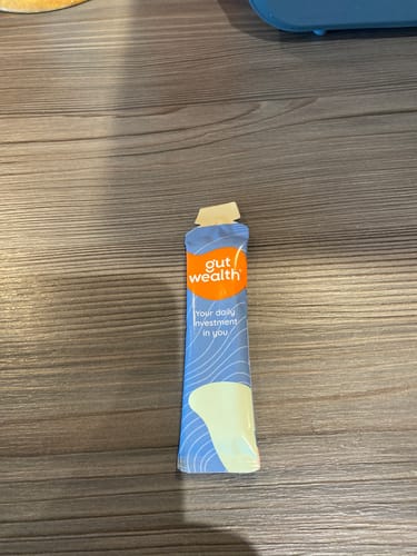 Customer photo review of Gut Wealth® daily liquid supplement calms digestive upset, improves bowel regularity and reduces bloating