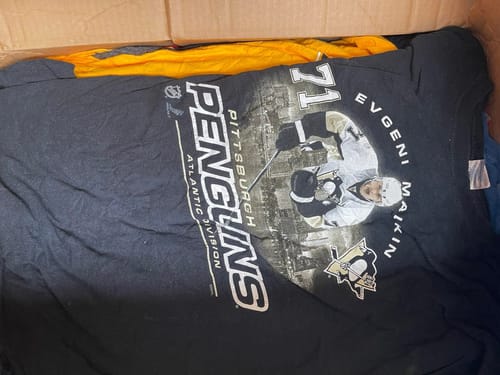 Customer photo review of Wholesale Pro Sports T-shirts
