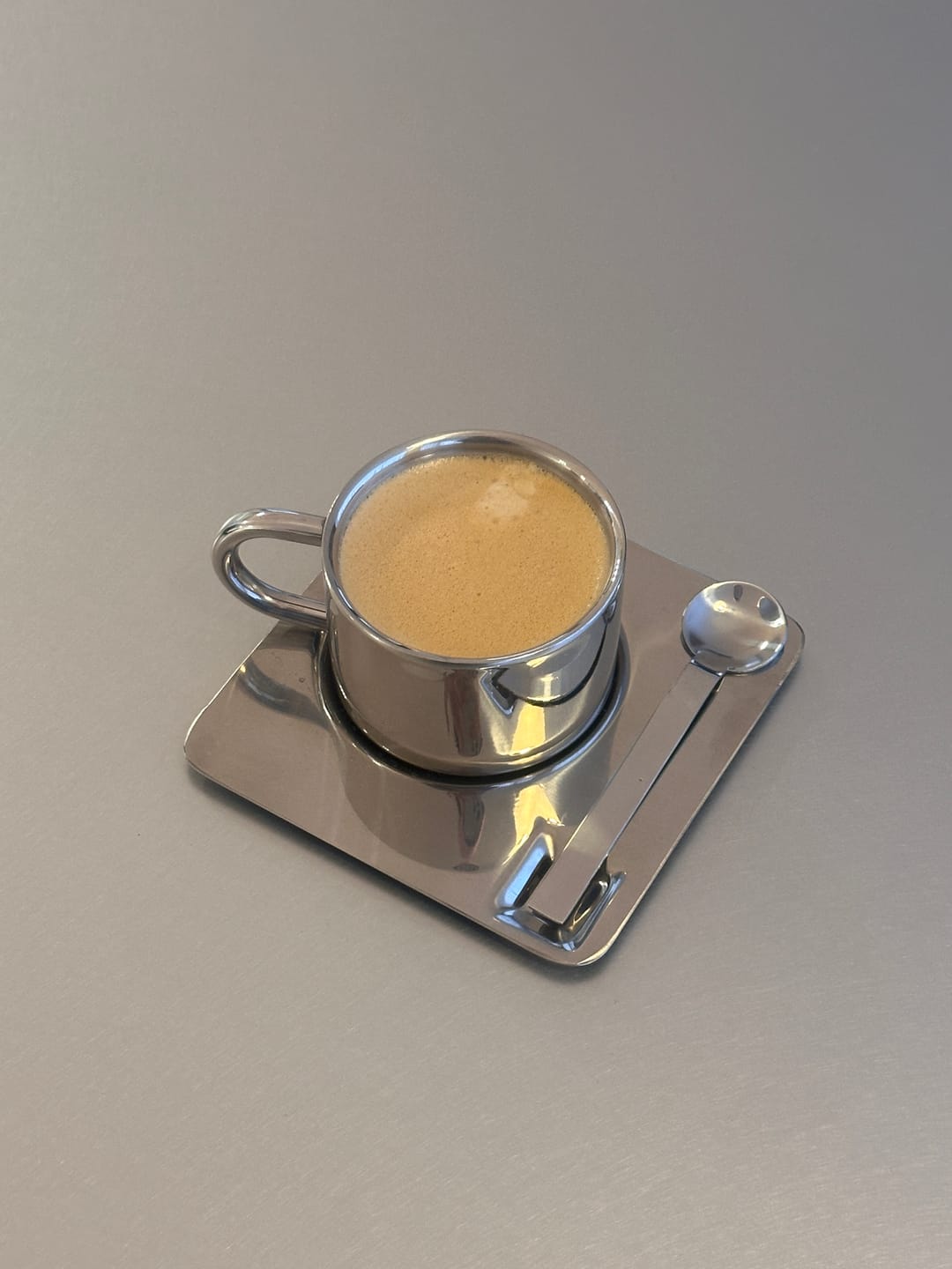 Customer photo review of Venice Mirror Cup with a Saucer & Spoon