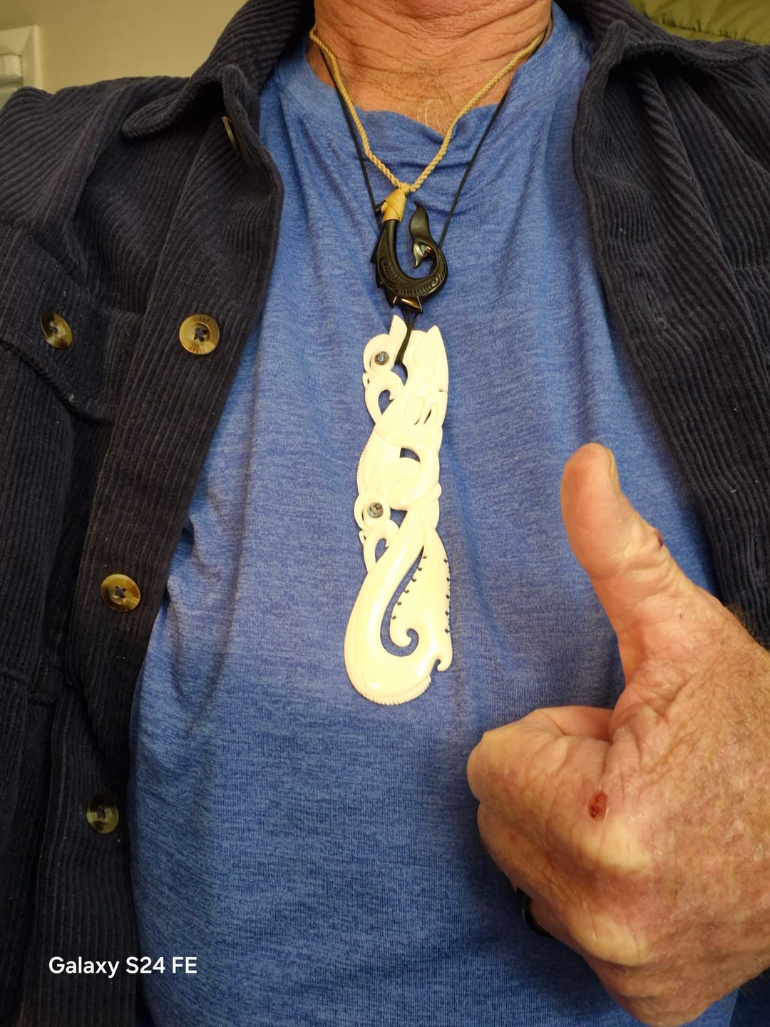 Customer photo review of Intricately Carved 12.5cm Maori Bone Manaia Necklace
