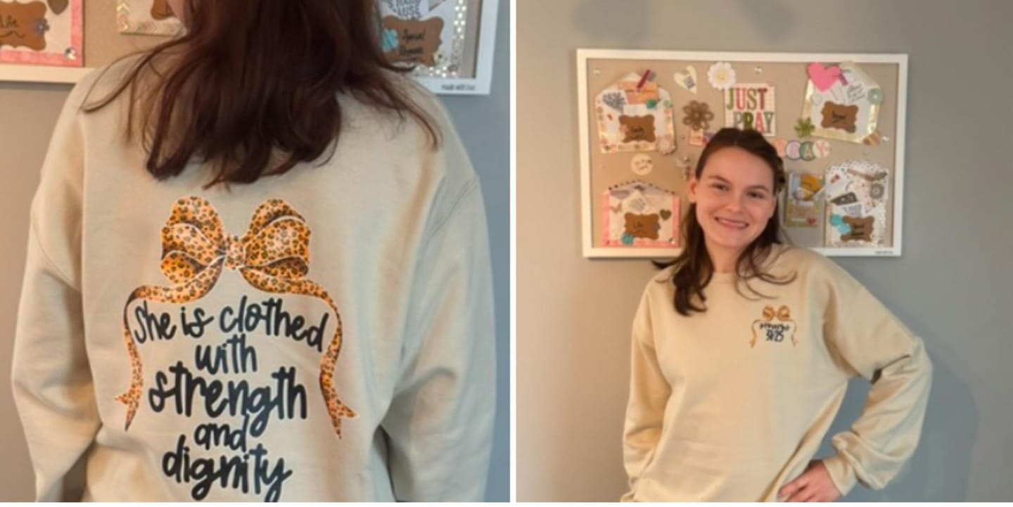 Customer photo review of She Is Clothed With Strength and Dignity, Front and Back, Proverbs, Bows, Ribbon, Girly, Religious, Christmas, Faith Sweatshirt