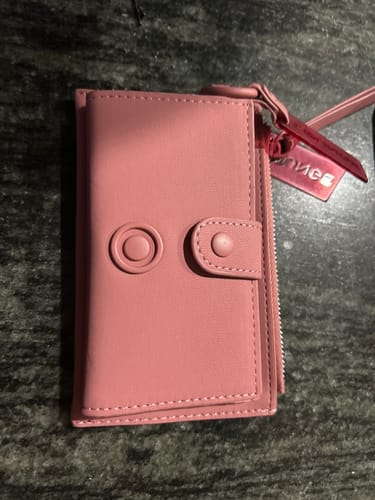 Reseña con foto de un cliente sobre Billetera Broche To Go