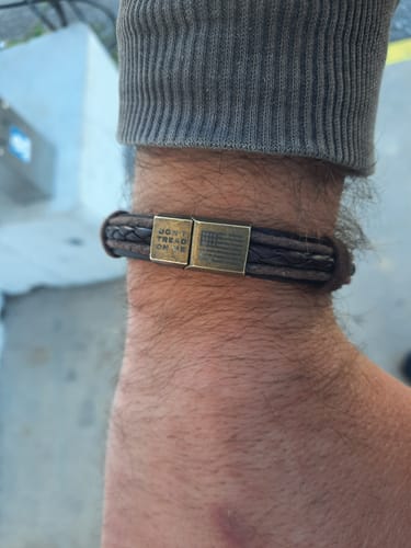 Customer photo review of Don't Tread On Me Leather Bracelet: Helps Pair Veterans With A Service Dog or Shelter Dog