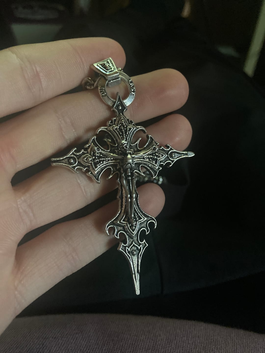 Customer photo review of Spire Cross Necklace