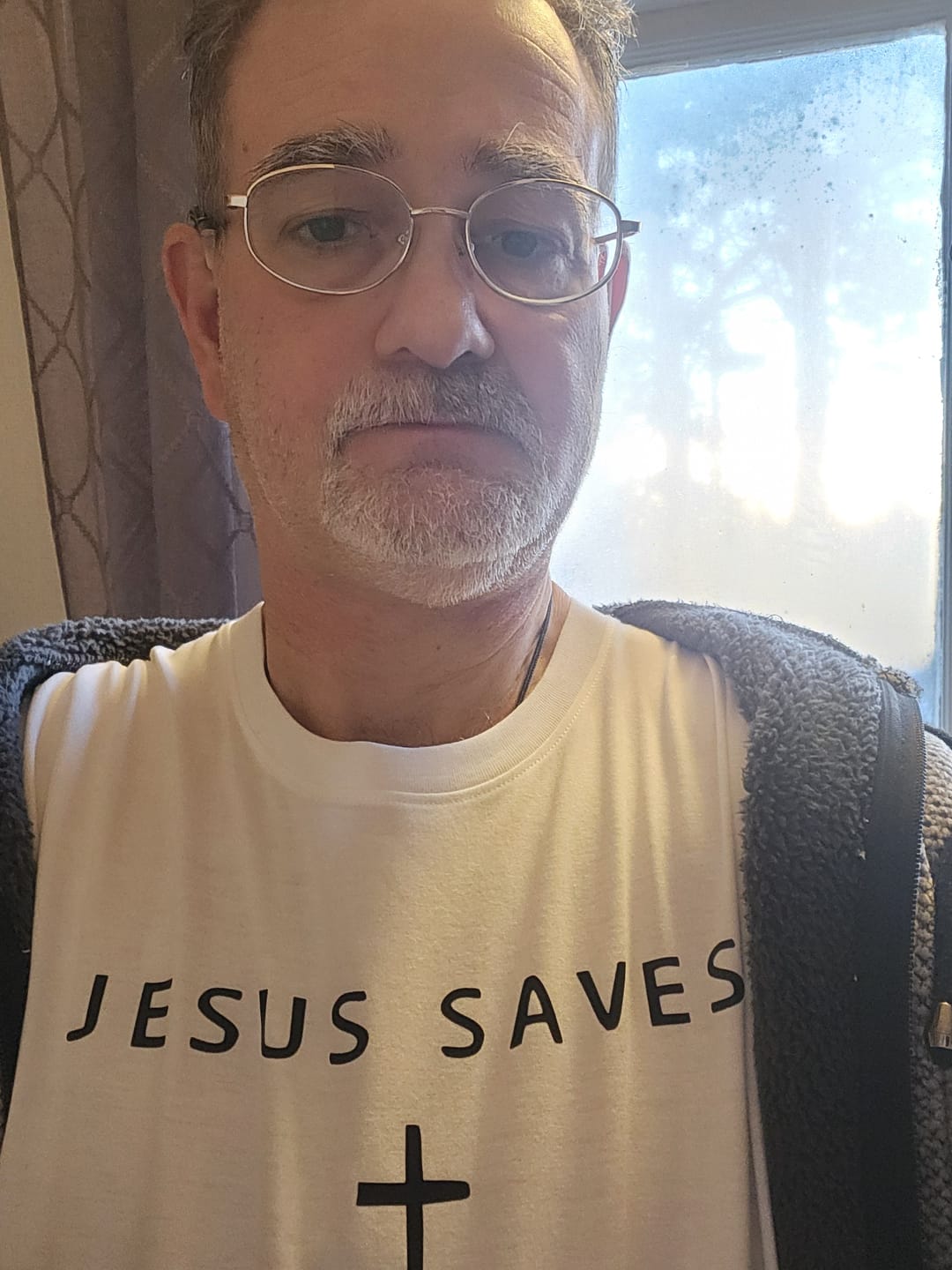 Customer photo review of Jesus Saves T-Shirt