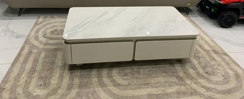 Customer photo review of Sản phẩm có sẵn - Bàn trà Sereno màu trắng, mặt đá Ceramic, thiết kế 4 ngăn kéo tiện lợi kích thước 1250 * 650 mm