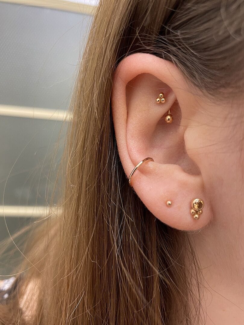 Customer photo review of 14K Gold Seamless Segment Clicker Cartilage Helix Hoop Earring 18G16G