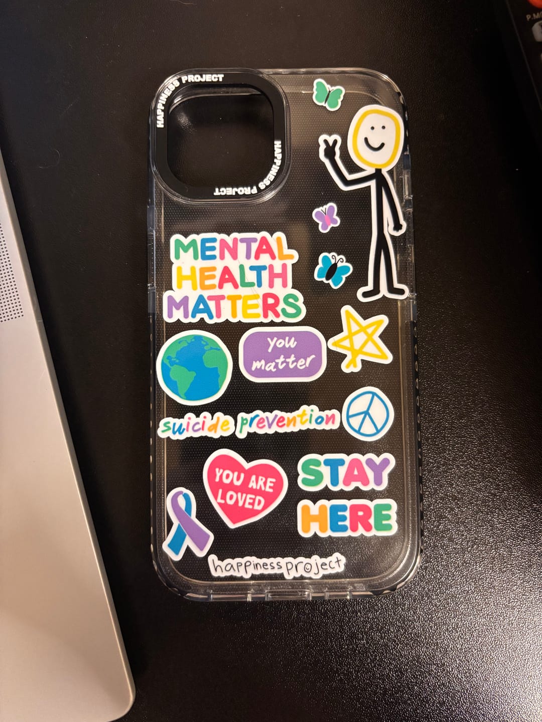 Customer photo review of Happiness Phone Case