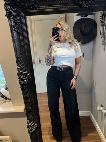 Customer photo review of reading is sexy baby tee