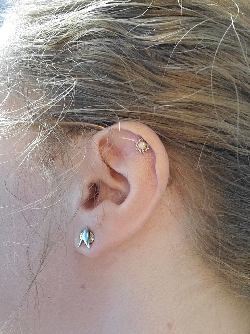 Customer photo review of 14K Gold Opal Sunflower Cartilage Earring 20G18G