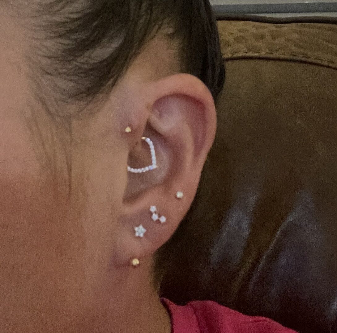 Customer photo review of 14K Gold Curve Cubic Cartilage Earring 20G