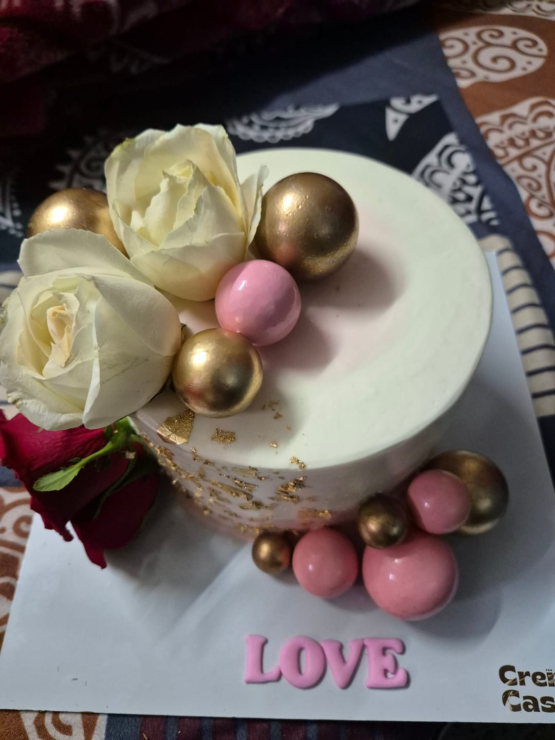 Customer photo review of Floral gold Cake