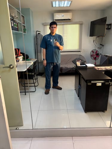 Customer photo review of Zip-Up Polo MoveTech® Scrub Top - Men / Pacific Tide