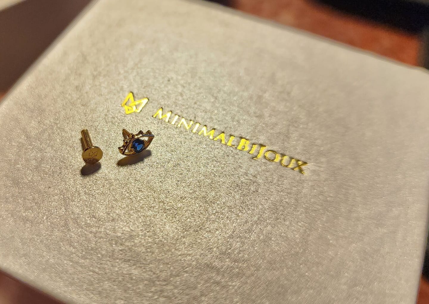Customer photo review of 14K Gold Color Cubic Evil Eye Internally Threaded Labret Piercing 18G16G