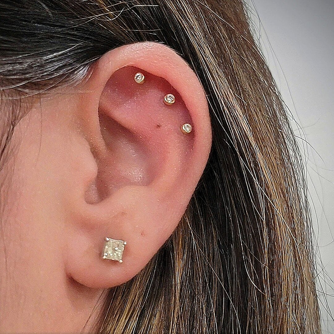 Customer photo review of 14K Gold Internal Minimal Cubic Labret Piercing 18G16G