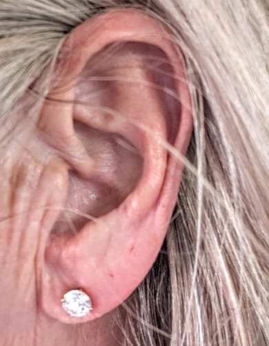 Customer photo review of M & Co. 4-Prong Martini Setting Diamond Stud Earrings