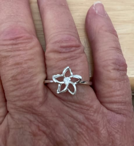 Customer photo review of Sterling Silver Floating 12mm Plumeria with CZ Ring