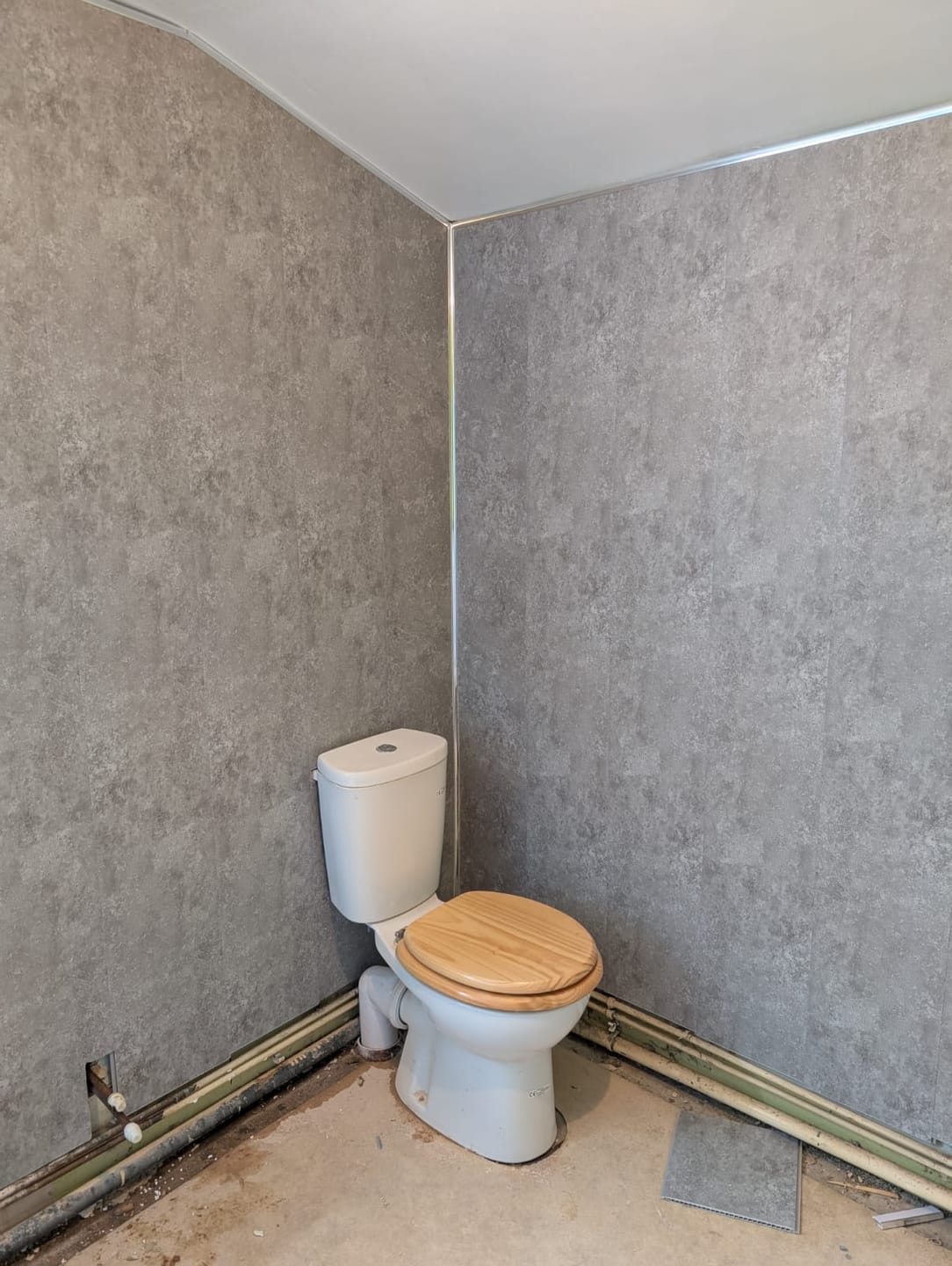 Customer photo review of 8mm Light Concrete Bathroom Wall Panel 2.6M