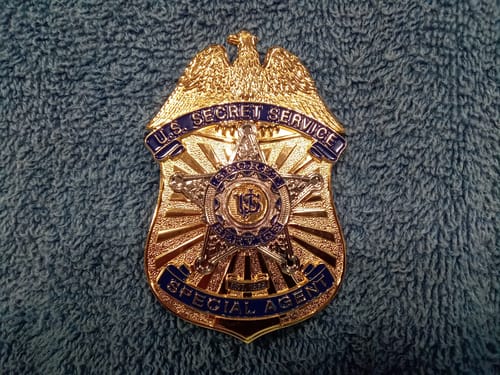 Customer photo review of USSS US Secret Service Special Agent Badge Solid Copper Replica Movie Props