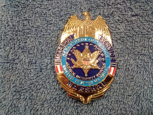Customer photo review of US Marshal Service Eagle Badge Solid Copper Replica Movie Props