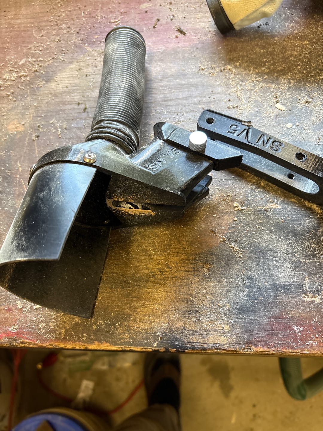 Customer photo review of Ridgid 12" Sliding Miter Saw Dust Collection Chute (R4222)