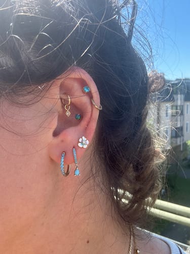 Customer photo review of White Flower Ohr Piercing