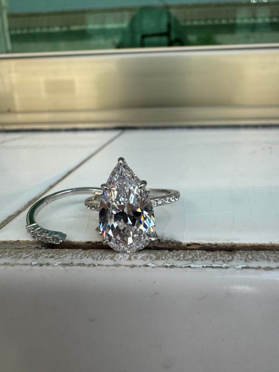 Customer photo review of S925 4.5Ct Pear Cut Wedding Ring & Open Wedding Band Bridal Rings Travel Rings For Her