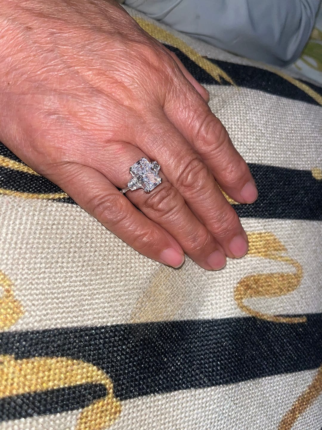 Customer photo review of Louily Gorgeous Three Stone Crushed Ice Radiant Cut Engagement Ring