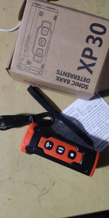Customer photo review of Anti Bark Dog Repeller Ultrasonic Rechargeable Dog Training Device