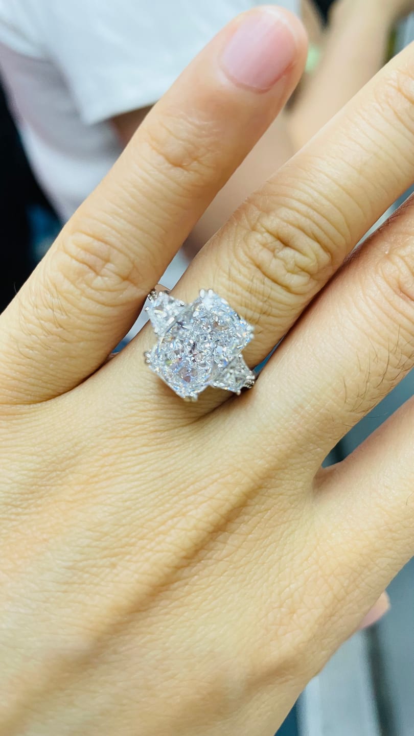 Customer photo review of Louily Gorgeous Three Stone Crushed Ice Radiant Cut Engagement Ring