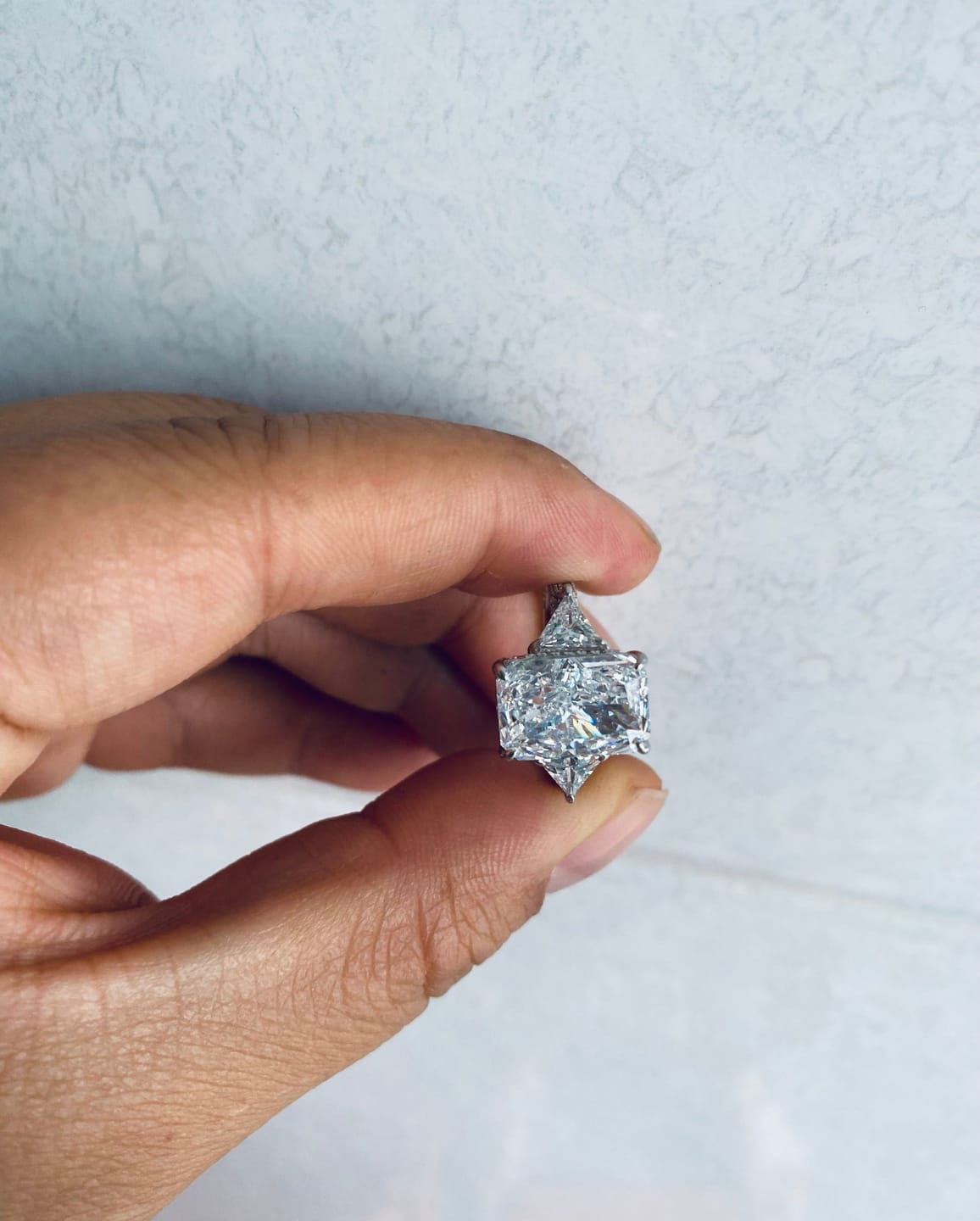 Customer photo review of S925 5.0 Carat Radiant Cut White/Pink Three Stone Engagement Ring With Hidden Halo For Everyday Wear