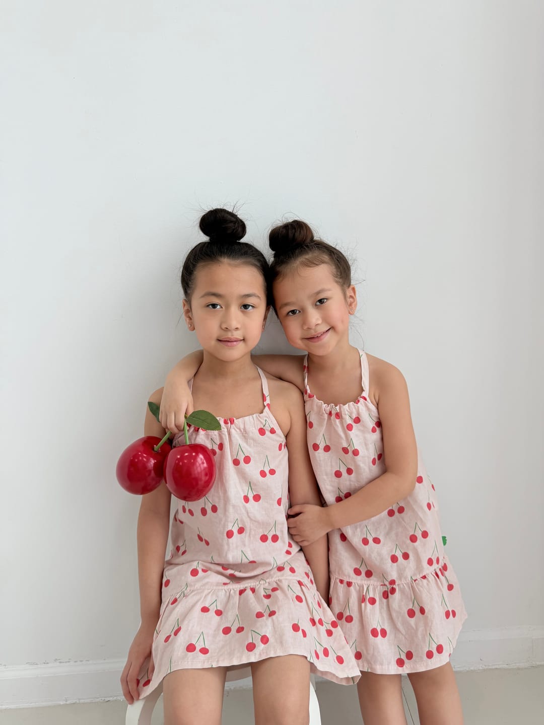 Customer photo review of Linen Cherry Strappy Kid Dress