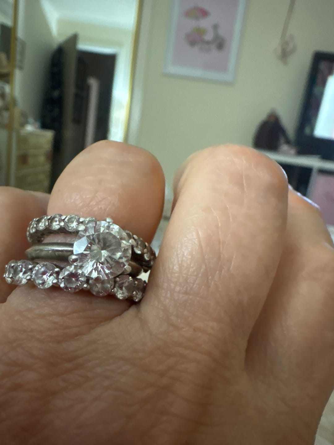 Customer photo review of Round Sona Diamond Sterling Silver Wedding Band Eternity Ring