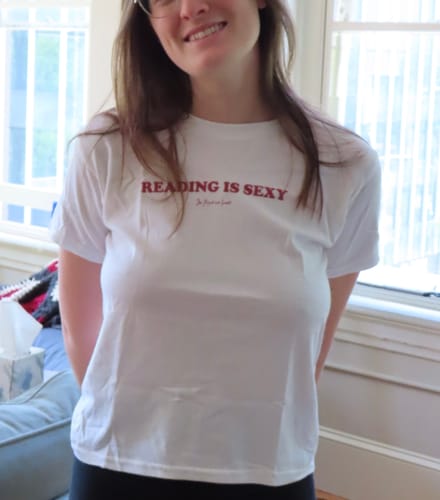 Customer photo review of reading is sexy baby tee